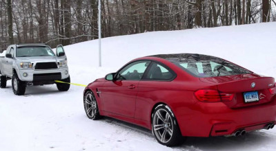 Toyota Tacoma vs BMW M4 in pull the rope contest! - Photo