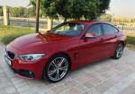 Aston Martin has a Compact Sports Sedan going after BMW's 4 Gran Coupe market - Photo