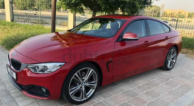 Aston Martin has a Compact Sports Sedan going after BMW's 4 Gran Coupe market - Photo