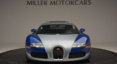How much would you pay for this Blue-Silver <span style='background: #ff0000'>Bugatti</span> <span style='background: #ff0000'>Veyron</span> from 2008? - Photo
