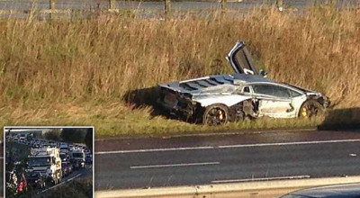 Lamborghini supercar worth £260,000 is left destroyed on the verge after M6 crash caused long tailbacks - Photo