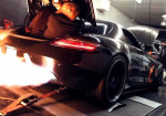 SLS AMG spewing flames and a guy is in the trunk. Nothing is faked. - Photo