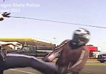 Biker Receives $180,000 After Being Kicked By Cop - Photo