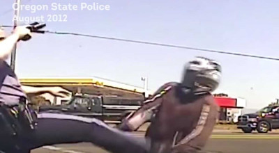 Biker Receives $180,000 After Being Kicked By Cop - Photo