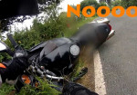 Road Rage: Biker vs Sign! - Photo
