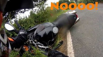 Road Rage: Biker vs Sign! - Photo