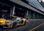This Lamborghini Aventador looks like it was dropped in rainbow paint. - Photo