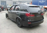 What do you think a BMW X5 M50d half burned is worth? - Photo