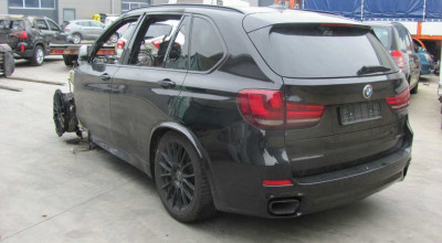 What do you think a BMW X5 M50d half burned is worth? - Photo
