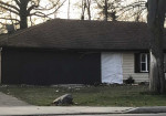 2011 Ford Mustang crashed into a house - Photo