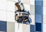 An SUV Almost Flew From A MultiStore PArking Lot - Photo
