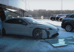 The Russian Vlogger Smashed Porsche Dealer's Window With His New Taycan! - Photo