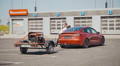 Tesla Charging Issues Made A Russian Vlogger To Hit The Road With A Generator - Photo