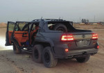 Six-Wheeled Beast: Land Cruiser Pickup Truck - Photo