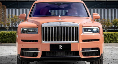 We Know You'll Be Impressed By This Dusty Coral Rolls-Royce Cullinan - Photo