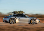 Watch A 750 HP Porsche 911 Turbo S With A Christmas Tree On The Roof Fly - Photo