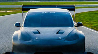 Modified Tesla Model 3 With Huge Aerodynamics - Photo