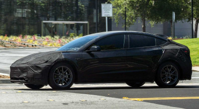 Revamped and Reimagined: A Sneak Peek at <span style='background: #ff0000'>Tesla</span>'s Updated Model 3 - Photo