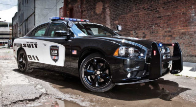 Sirens, Screens, and Speed: Behind the Scenes Look at Modern Police Cars and Technology in 2023 - Photo
