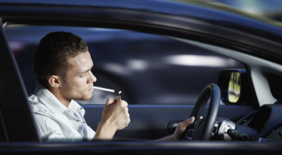 Up In Smoke: The Legality and Implications of Smoking While Driving - Photo