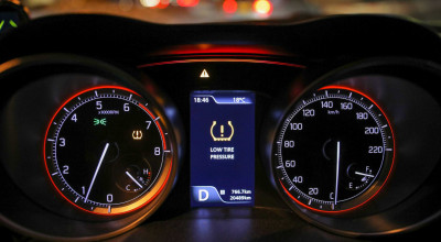 Decoding the Mystery: Why Your Car's Tire Pressure Light Stays On - Photo