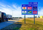 Highway Sign Secrets: How Businesses Get on Those Blue Roadside Signs - Photo