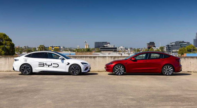 Tesla vs. <span style='background: #ff0000'>BYD</span>: The Electric Showdown of Battery Power and Affordability - Photo