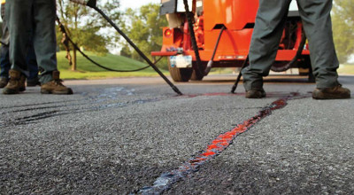 Unraveling Road Repair: The Essential Role of Crack Sealing - Photo