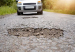 Avoiding Pothole Damage: Tips to Protect Your Car in the City - Photo
