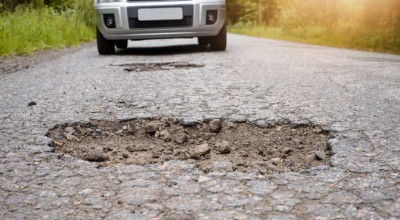 Avoiding Pothole Damage: Tips to Protect Your Car in the City - Photo