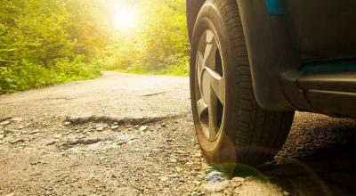 Bad Roads: How Potholes, Cobblestones & Ruts Damage Your Car - Photo
