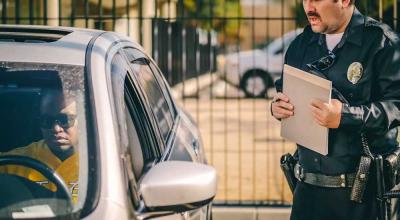 The Police Car Tap: Why Officers Touch Your Vehicle During a Stop - Photo