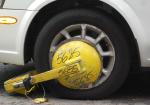 Car Booted? What to Do & How to Get It Off Your Wheel - Photo