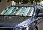 A Windshield Sunshade Doesn’t Make a Parked Car Cool, But It Absolutely Keeps It From Becoming a Total Nightmare - Photo