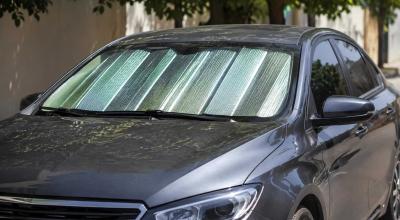 A Windshield Sunshade Doesn’t Make a Parked Car Cool, But It Absolutely Keeps It From Becoming a Total Nightmare - Photo