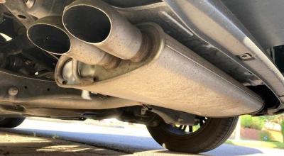 That Tiny Hole in Your Muffler May Be There on Purpose - Photo