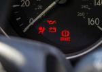 The Parking Brake Is Off, but the Red Light Stayed On. Check the Fluid - Photo