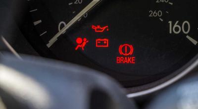 The Parking Brake Is Off, but the Red Light Stayed On. Check the Fluid - Photo