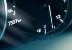 A Ford Engineer Got Soaked and Invented the Tiny Arrow Beside Your Fuel Gauge - Photo
