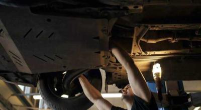That Awful Scraping Under Your Car Could Be a Loose Plastic Panel - Photo