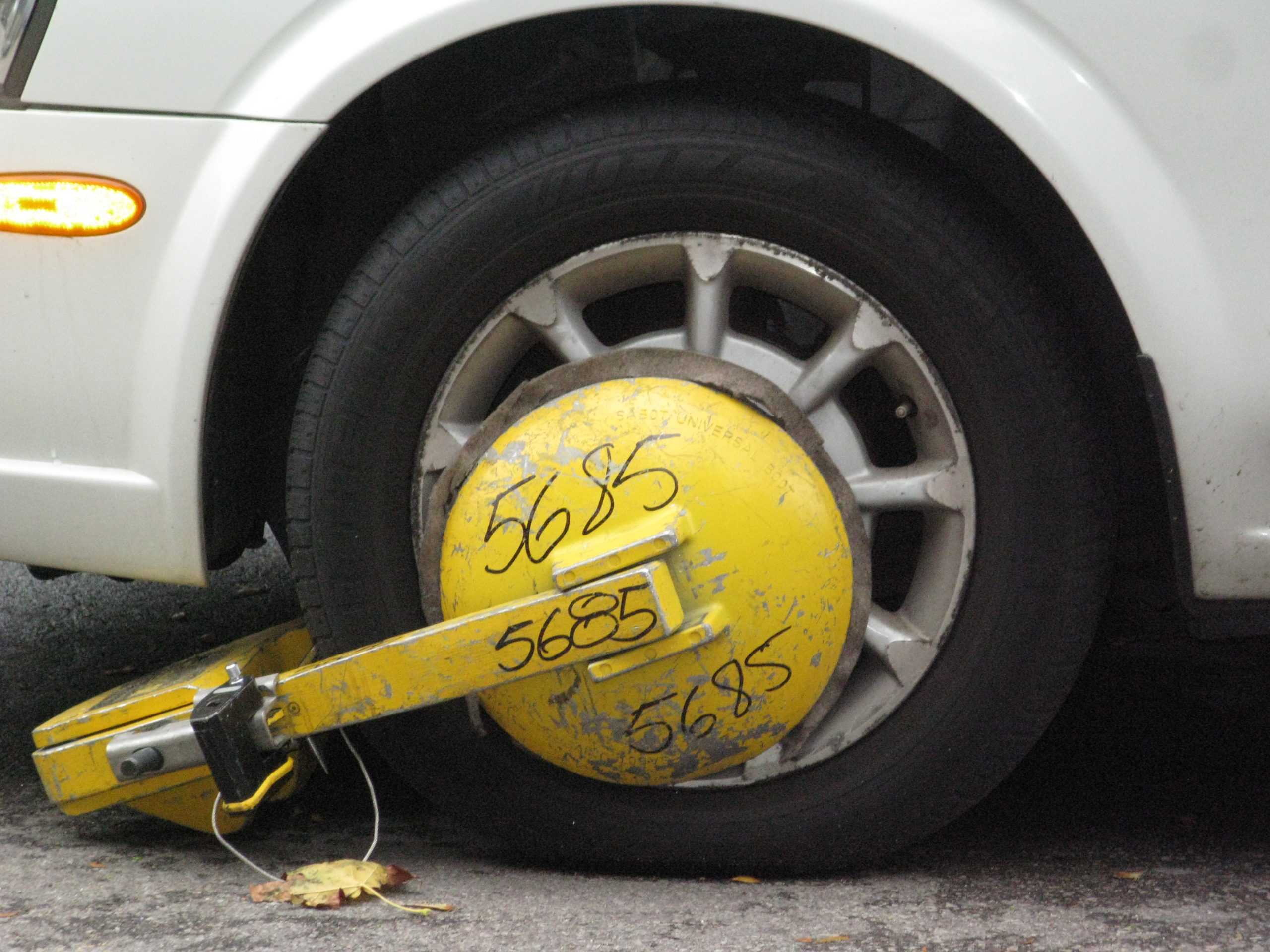 Car Booted? What to Do & How to Get It Off Your Wheel